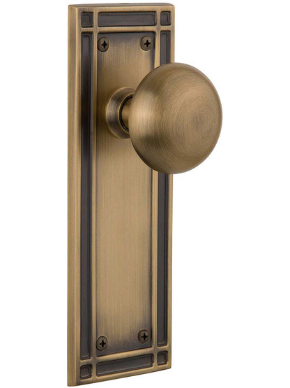 Mission Door Set with Classic Round Knobs in Antique Brass.